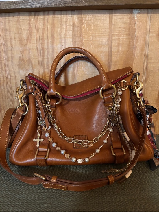 Dooney & Bourke Handbags - Dooney & Bourke leather tan handbag with Chain Accents & charms.